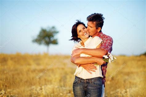 Check spelling or type a new query. Happy couple on the field — Stock Photo © apid #19922535