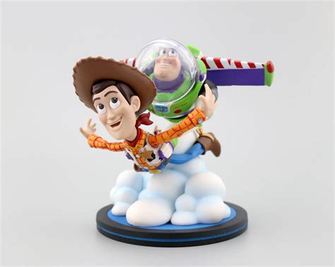 Dan The Pixar Fan Toy Story Buzz And Woody Q Fig Max Figurine By Qmx