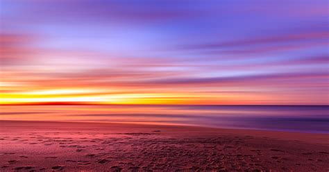 Purple Yellow Sunset On The Beach Free Image Download