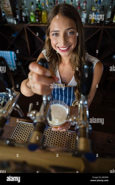 Beautiful Barmaid Pouring Beer In Hi Res Stock Photography And Images