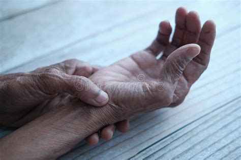 Close Up Of Senior Women Hand Suffering Wrist Pain Stock Image Image