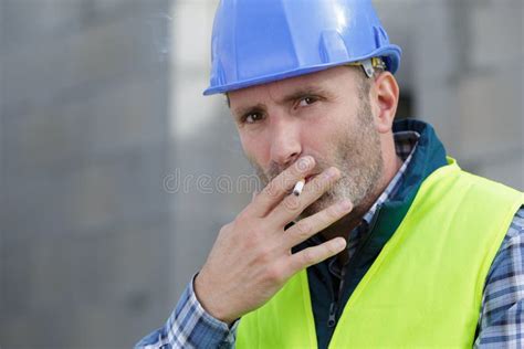 Smoking Cigarette On Construction Site Stock Photo Image Of Outdoors