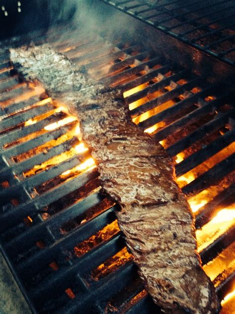 Cut the chicken into long, thin strips and place in a large dish. This is a skirt steak, marinated in my modified Pioneer ...