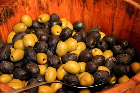 Marinated Olives In Wooden Barrel Healthy Snack Containing Natural