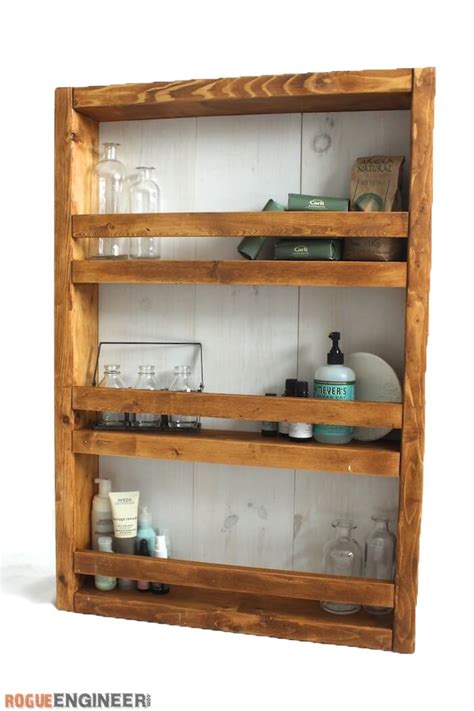 If your medicine cabinet is constructed from timber, carefully wipe down the shelves and sides of the cabinet with a remedy of water and vinegar. Apothecary Wall Shelf { Free DIY Plans } Rogue Engineer