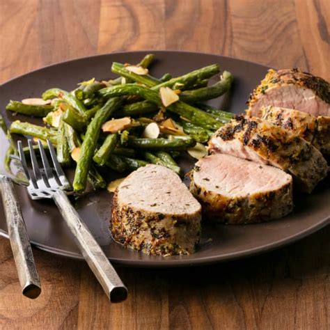Place tenderloin, smooth side up, on rack in large roasting pan (17 by 13 1/2). Lemon-Herb Pork Tenderloin with Green Beans | Cook's Country