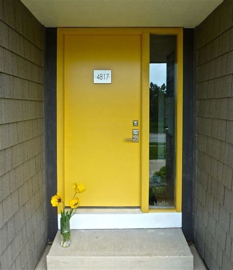 Modern Yellow Front Door With A Glass Sidelight Mid Century Modern