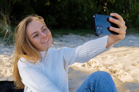 Portrait Of Happy Young Woman Take Selfie On The Beach Sea Ocean