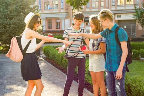 Premium Photo Happy Teenagers Friends Walking Talking Enjoying Day