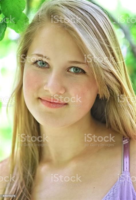 Fresh Wholesome Teenage Girl Portrait Blonde Hair Blue Eyes Stock Photo