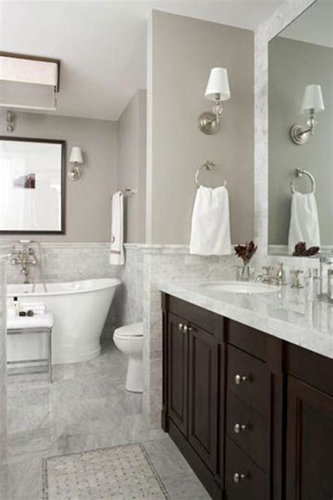 Ancient marble is ideal for a guest bathroom, as it can be dressed up in a variety of ways with colorful accents and appeals to all genders and tastes. 29 white marble bathroom wall tiles ideas and pictures 2020