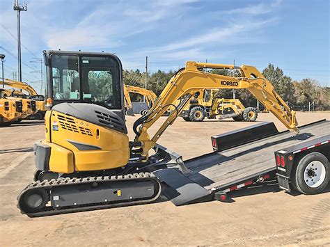 learn  dos  donts  trailering compact excavators compact equipment