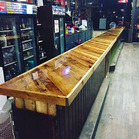 Maybe you would like to learn more about one of these? Bar top made from pallet boards and covered with epoxy ...
