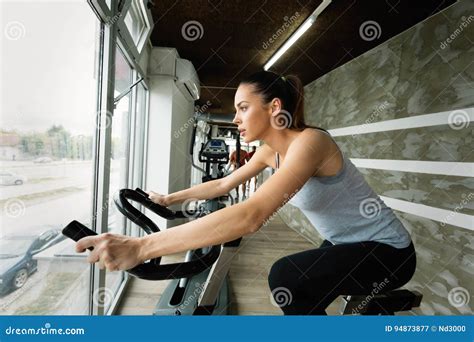Young Beautiful Woman Doing Indoor Biking Exercise Stock Image Image Of Active Sports 94873877