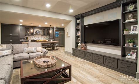 Man Cave Tv Room with Open Concept into Wet Bar and Dining Area By MacLaren Kitchen and Ba ...