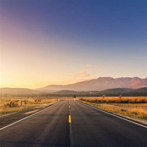 Road With Sunset And Mountains Tap To See More Beautiful Roads Of