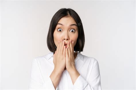 Premium Photo Close Up Face Of Asian Woman Gasping Looking Shocked And Speechless Holding