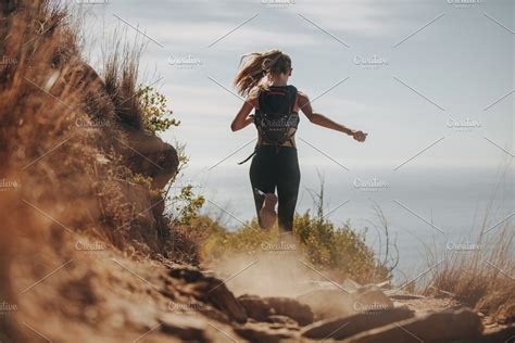 Female Running Over Rocky Trails Running Photos Running Photography Trail Running Photography