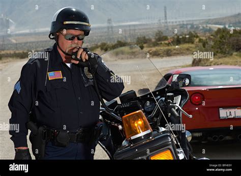 Portrait Of Traffic Cop Using Radio Stock Photo Alamy