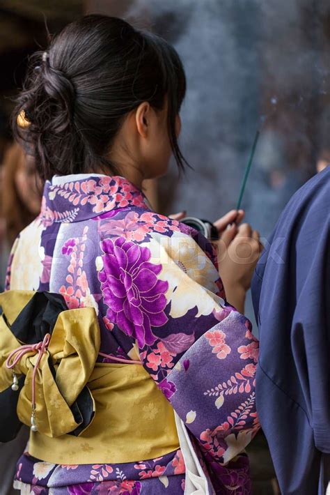 Japanese Women Wear A Traditional Dress Called Kimono For Sakura