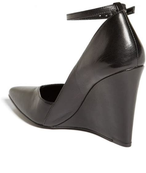 Nine West Eviee Leather Wedge Pump In Black Black Leather Lyst