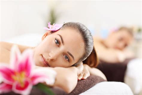 Two Beautiful Women Getting Massage In Spa Stock Photo Image Of Relaxation Hand