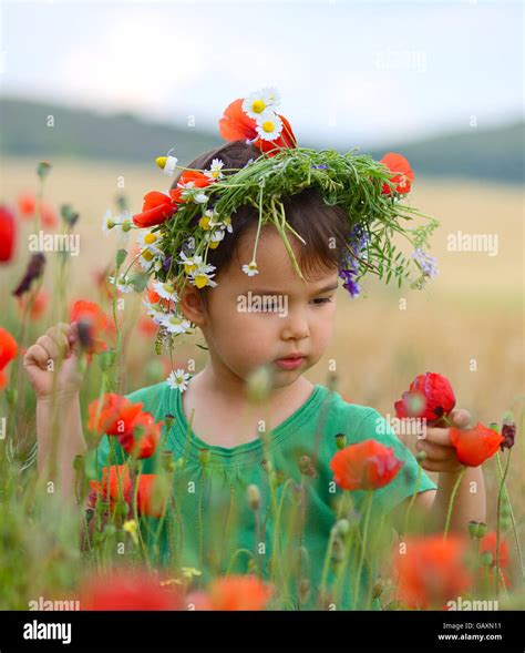 Happy Cute Child Girl On Poppies Field Happy Children Stock Photo Alamy