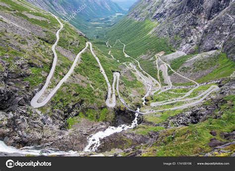 Trollstigen (also known as the troll's path or road) is a winding mountain drive in norway's reinheimen national park that takes visitors through hairpin turns of the trolltindene mountain range. The Trollstigen, Norway — Stock Photo © uhg1234 #174100106