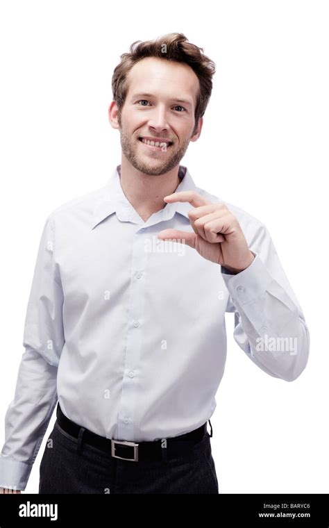 Young Man Making Hand Gesture Smiling Portrait Stock Photo Alamy