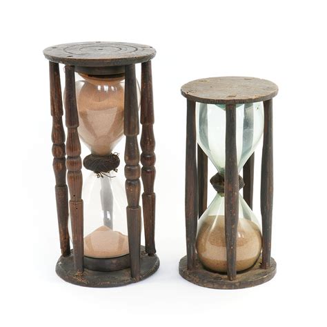 File 5128 Hourglasses Two Large Hourglasses With Clear And Bluish Glass Containing Orange