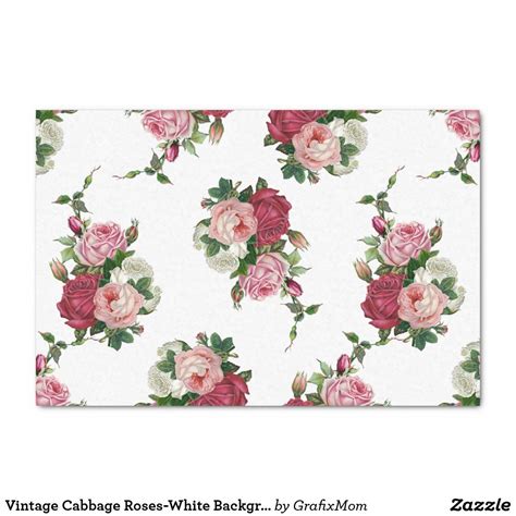 A White Background With Pink Roses And Green Leaves On The Bottom Right