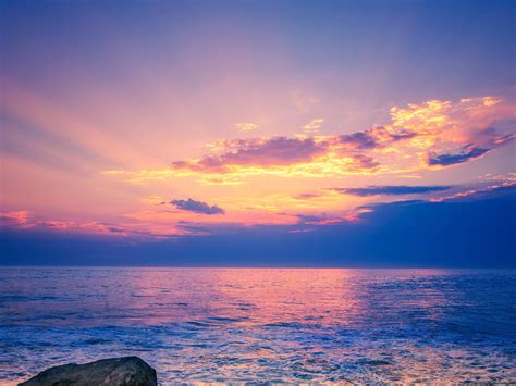 Light Purple Sky Above Beach Rock 4k Nature Hd Desktop Wallpaper