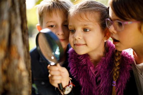 Kids With Magnifying Glass Stock Photo And More Pictures Of Adventure