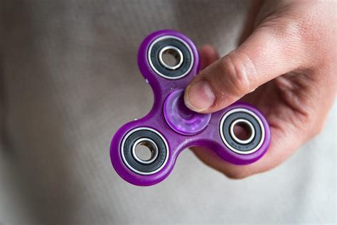 here s the science behind the fidget spinner craze