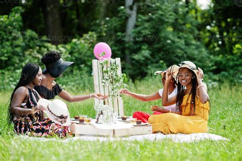 Group Of African American Girls Celebrating Birthday Party Outdoor With
