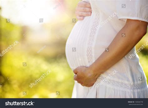 Close Up Of Pregnant Belly In Nature Stock Photo Shutterstock