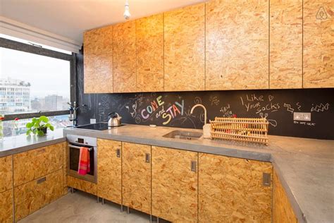 The grain of each layer of plywood is at right angles to each other. Kitchen cabinet doors made from oiled chipboard and a ...