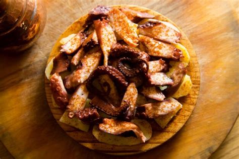 Premium Photo Pulpo A La Gallega Octopus Cooked With Boiled Potato