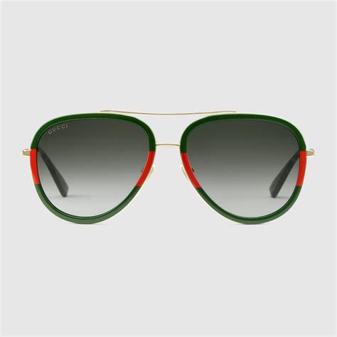 gold metal and web frame aviator sunglasses with green lenses gucci® us