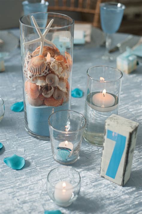 Wedding reception table decorations for any tastes. Nora & Brent's Beach Themed "Top of the Town" Wedding in ...