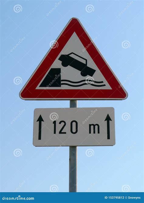 Traffic Sign Riverbank Falling Car In Water For 120m Stock Photo