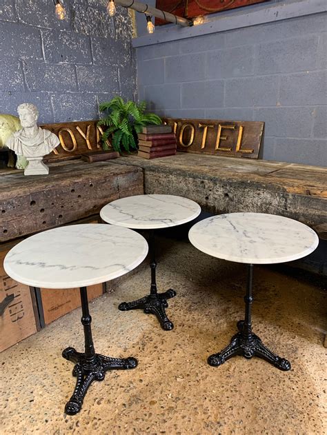 A Black Cast Iron Bistro Table With Marble Top 33 Belle And Beast