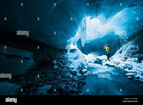 Man Exploring Ice Cave In Thórsmörk Iceland Stock Photo Alamy