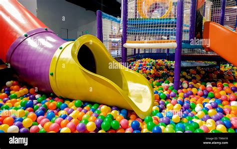 Closeup Image Of Colorful Slide On Children Playground With Lots Of