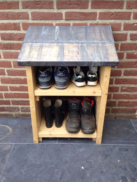 This shoe rack has pegs to store your shoes in standing position. Outdoor shoe storage! | Outdoor shoe storage, Diy shoe ...