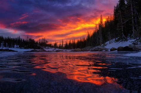 Vibrant Sunset Reflecting On The Frozen Dream Lake In Rmnp Oc