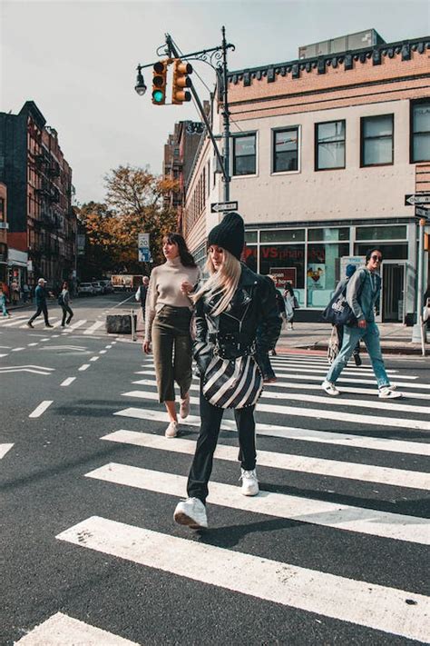 People Walking On Pedestrian Lane During Daytime · Free Stock Photo