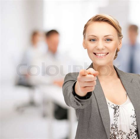 picture of attractive businesswoman pointing her finger stock image colourbox