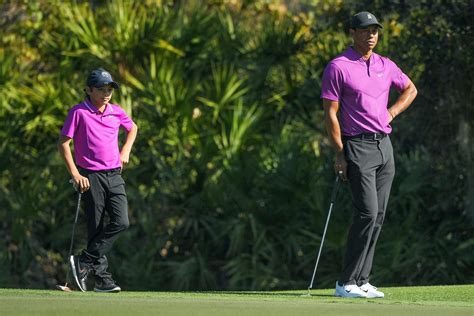 Photos Of Tiger Woods His Son Charlie Competing In Their First Golf