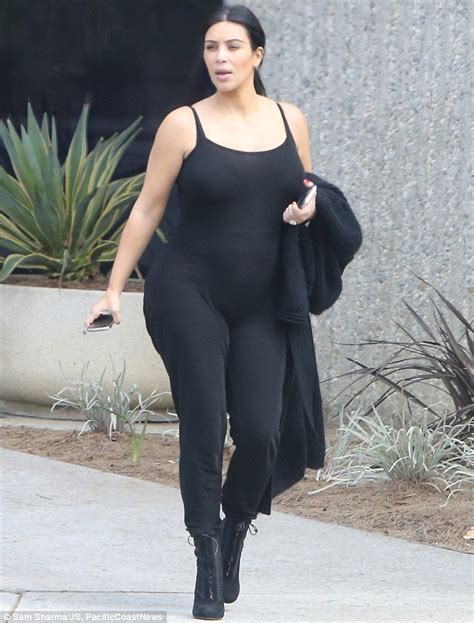 Pregnant Kim Kardashian Shows Off Baby Bump In Catsuit While Out In La